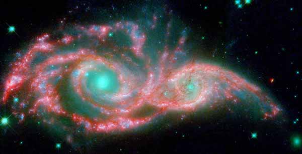 Galaksi IC 2163 dan NGC 2207 dari teleskop Spitzer